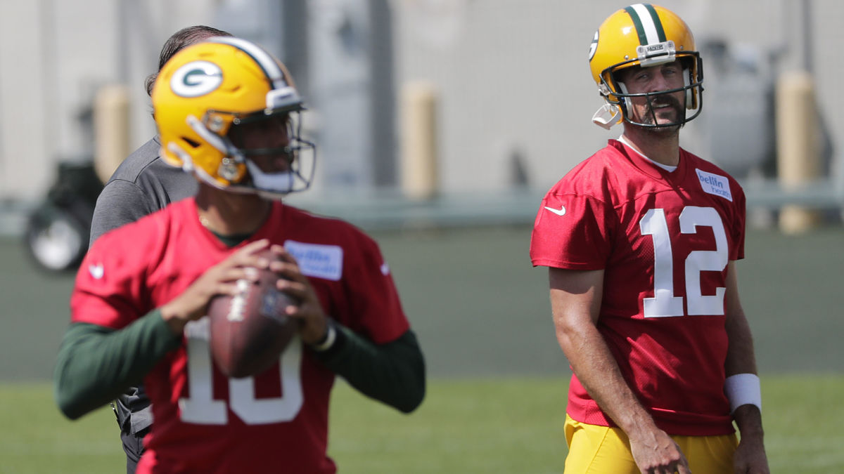Green Bay Packers quarterbacks Jordan Love and Aaron Rodgers