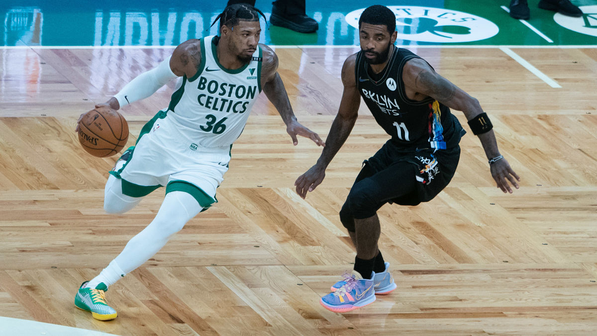 Boston Celtics guard Marcus Smart and Brooklyn Nets guard Kyrie Irving
