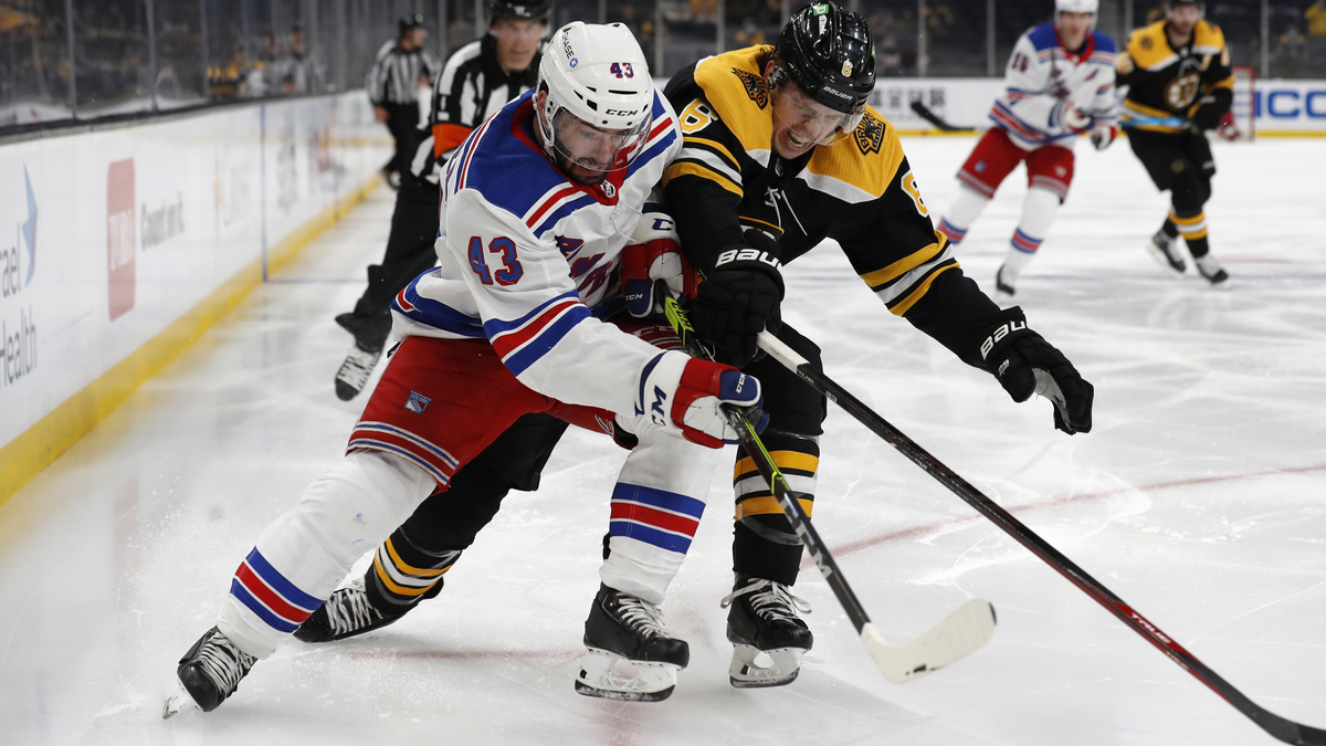 Boston Bruins defenseman Mike Reilly, New York Rangers forward Colin Blackwell