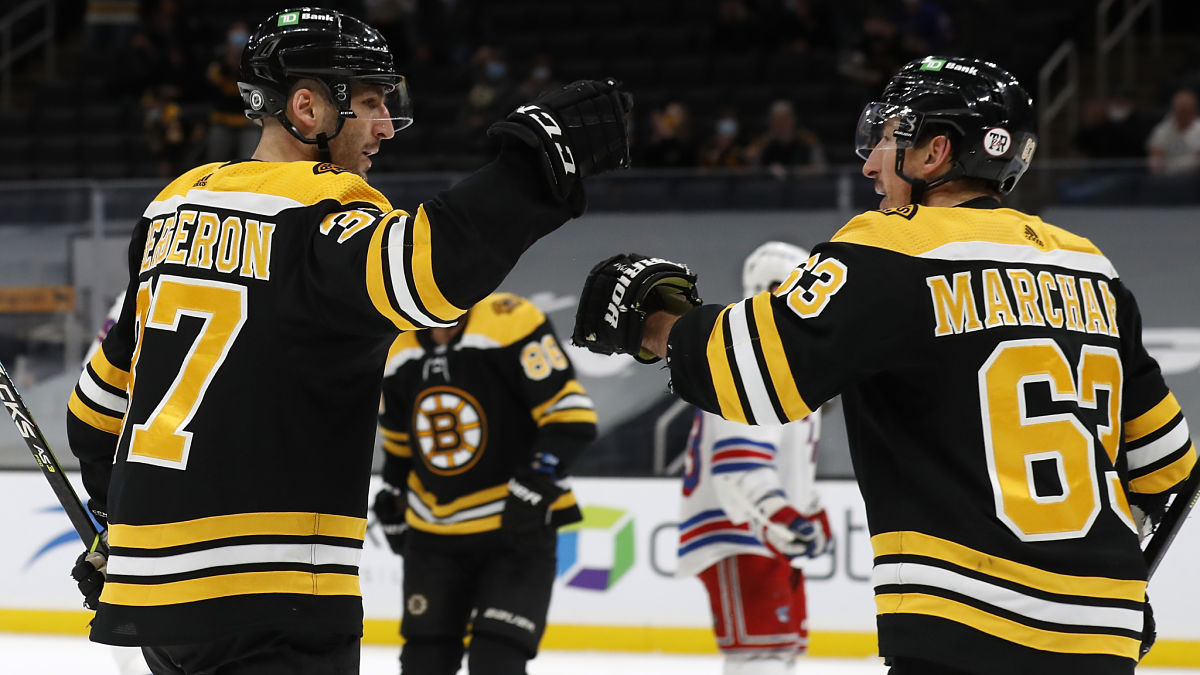 Bruins forwards Patrice Bergeron, Brad Marchand