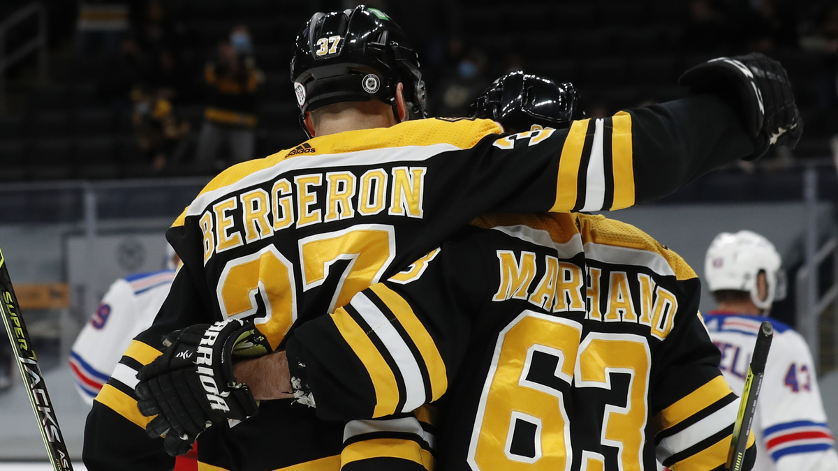 Boston Bruins Forwards Patrice Bergeron And Brad Marchand