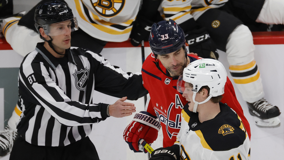 Boston Bruins forward Trent Frederic, Washington Capitals defenseman Zdeno Chara