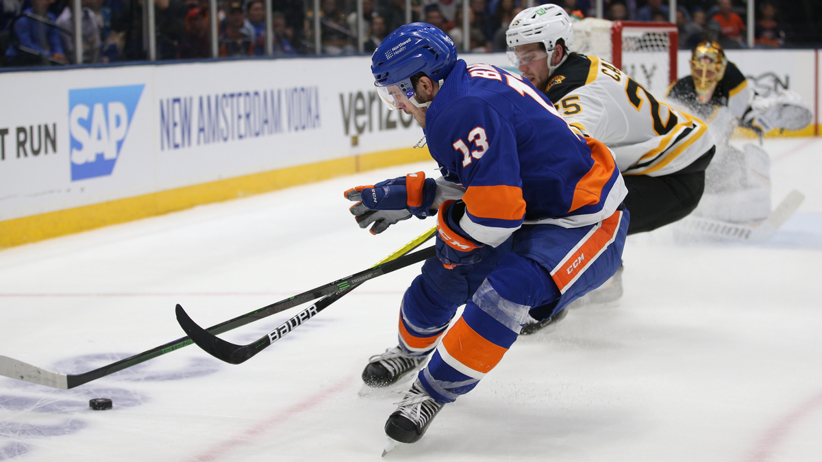 Boston Bruins defenseman Brandon Carlo, New York Islanders center Mat Barzal