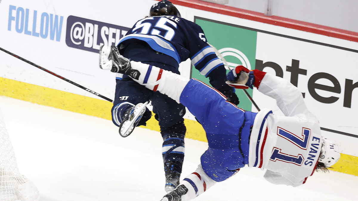 Winnipeg Jets forward Mark Scheifele, Montreal Canadiens forward Jake Evans