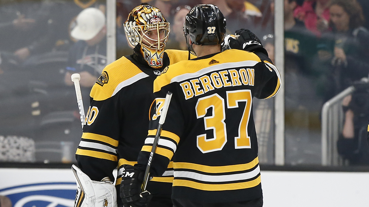 Boston Bruins Goalie Tuukka Rask And Center Patrice Bergeron