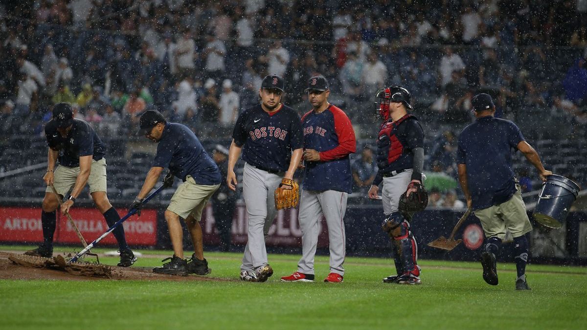 Boston Red Sox manager Alex Cora, pitcher Hirokazu Sawamura