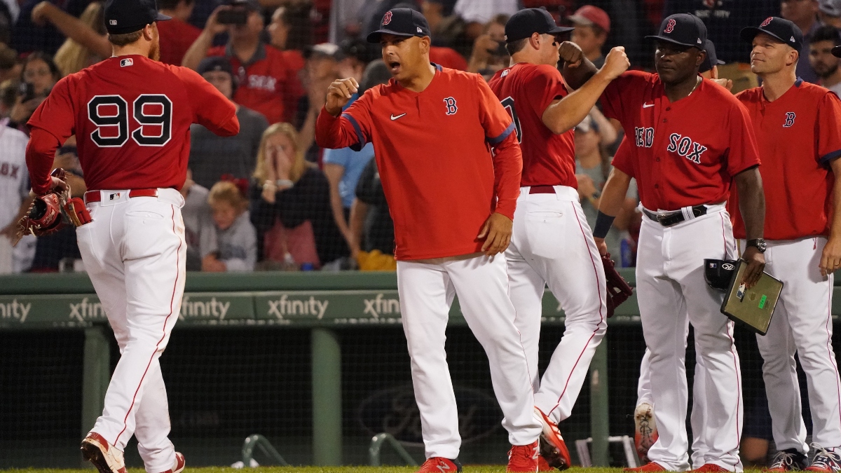 Boston Red Sox manager left fielder Alex Verdugo (99) and manager Alex Cora
