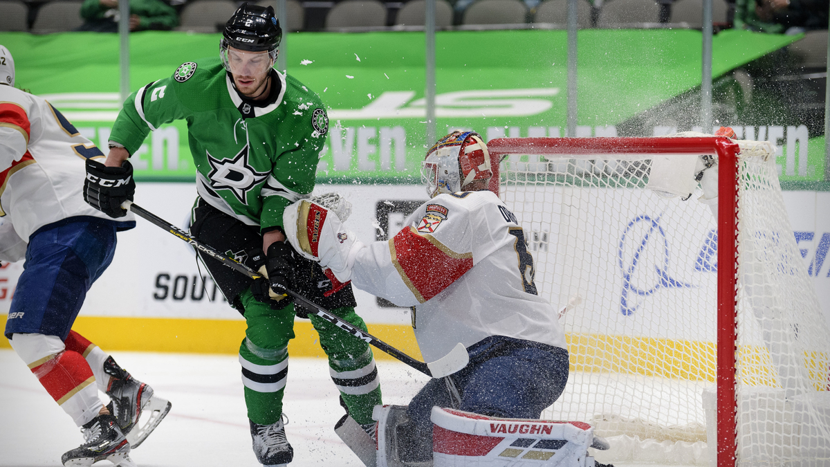 Seattle Kraken defenseman Jamie Oleksiak, goalie Chris Driedger