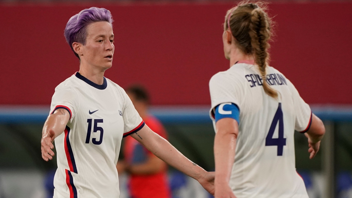 United States forward Megan Rapinoe (15) and defender Becky Sauerbrunn (4)