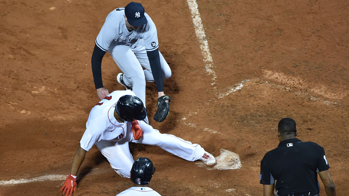Boston Red Sox third baseman Rafael Devers and New York Yankees pitcher Brooks Kriske