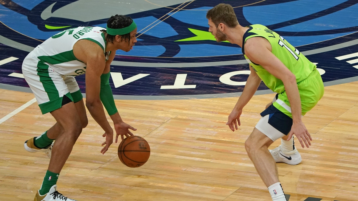 Boston Celtics guard Romeo Langford (45) and Minnesota Timberwolves forward Jake Layman (10)