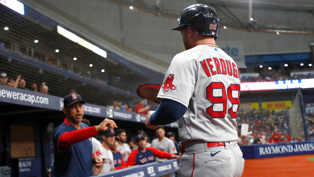 Boston Red Sox left fielder Alex Verdugo (99) and manager Alex Cora
