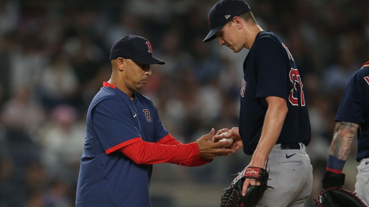 Boston Red Sox manager Alex Cora, pitcher Nick Pivetta