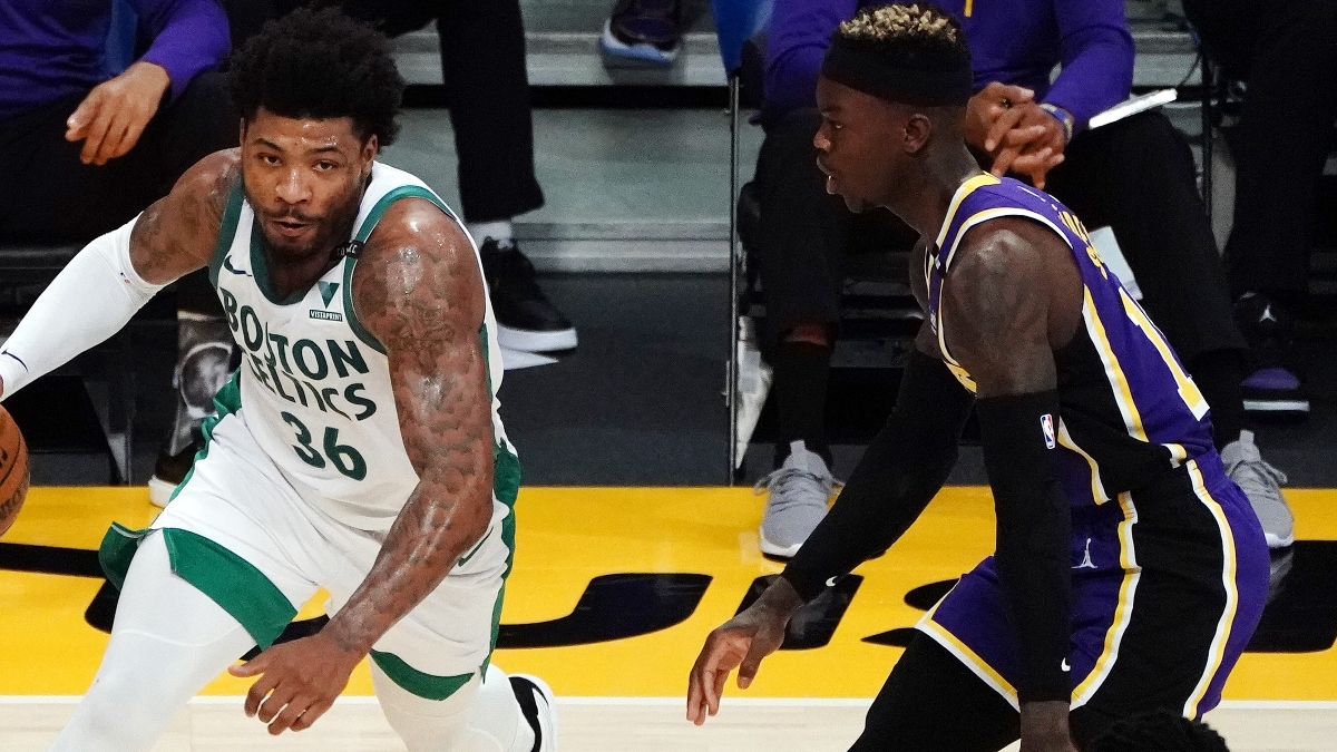 Boston Celtics guard Marcus Smart (36) and NBA guard Dennis Schroder (17)
