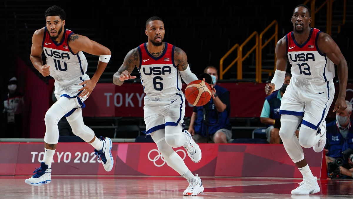 United States guard Damian Lillard (6), small forward Jayson Tatum (10) and center Bam Adebayo (13)