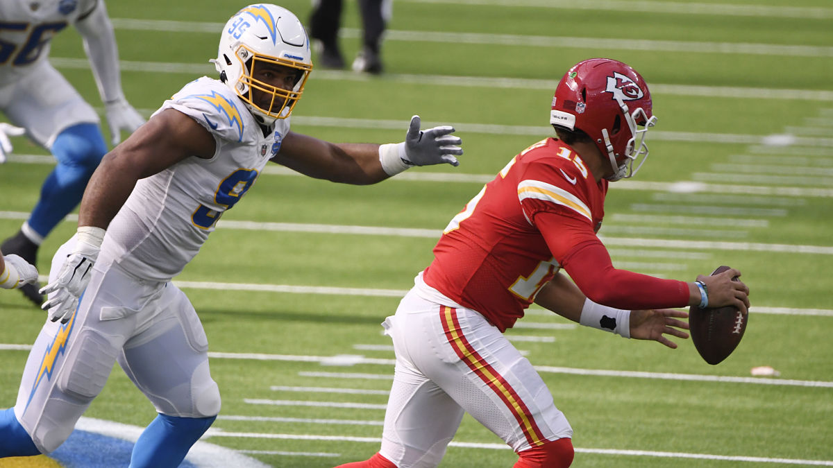 Los Angeles Chargers defensive tackle Jerry Tillery and Kansas City Chiefs quarterback Patrick Mahomes