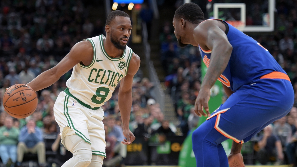 NBA guard Kemba Walker (8) and New York Knicks center Julius Randle (30)