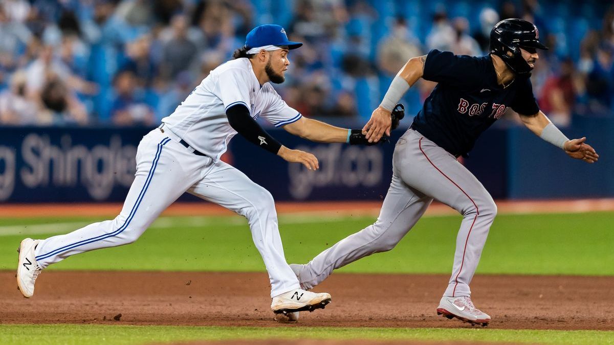 Toronto Blue Jays second baseman Santiago Espinal, Boston Red Sox second baseman Marwin Gonzalez
