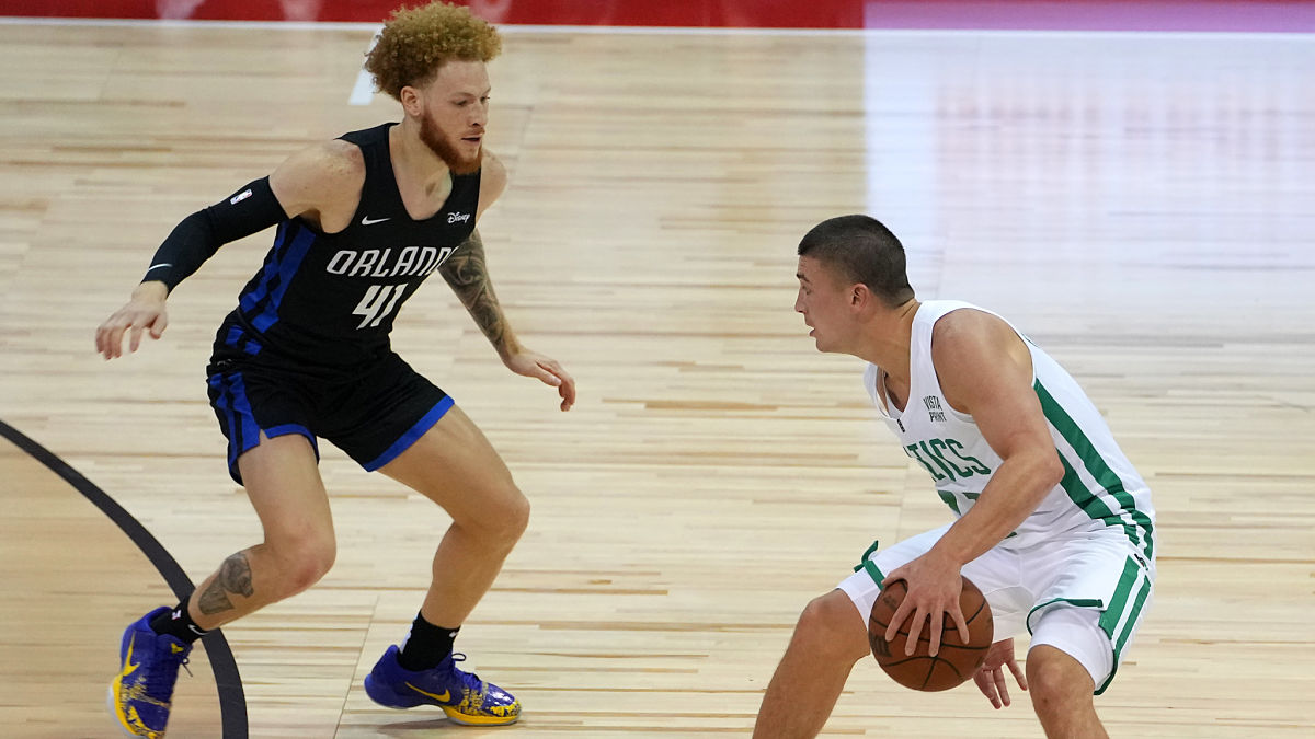 Orlando Magic guard Hassani Gravett and Boston Celtics guard Payton Pritchard