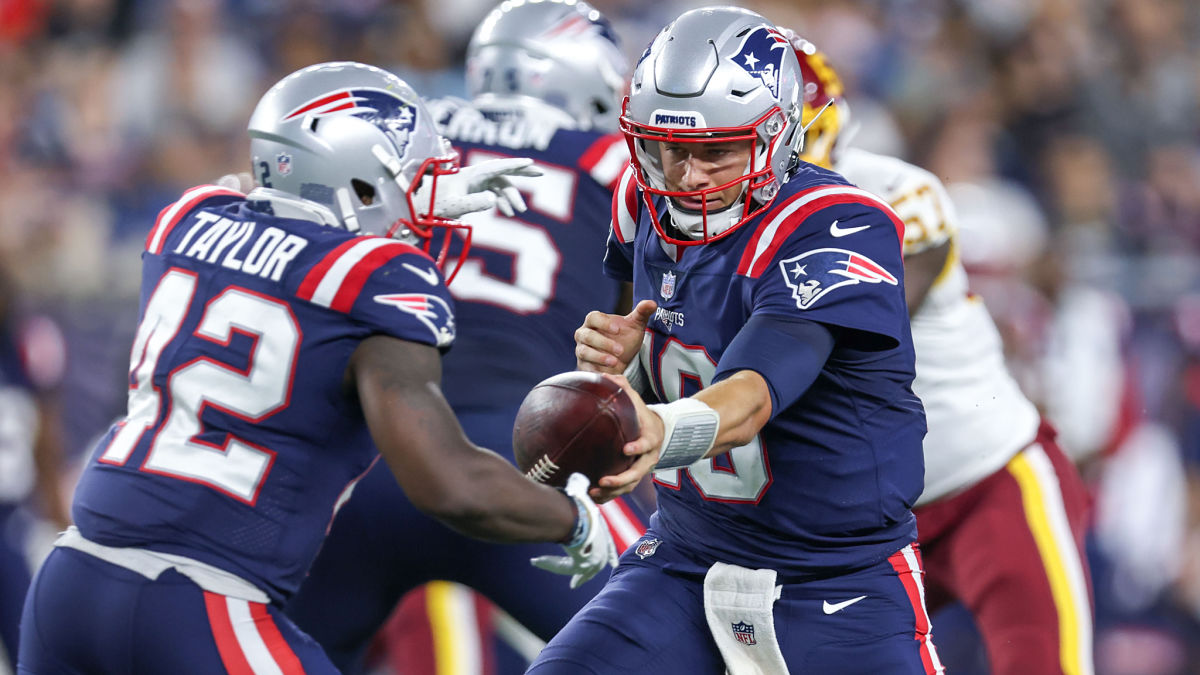 New England Patriots running back J.J. Taylor and quarterback Mac Jones
