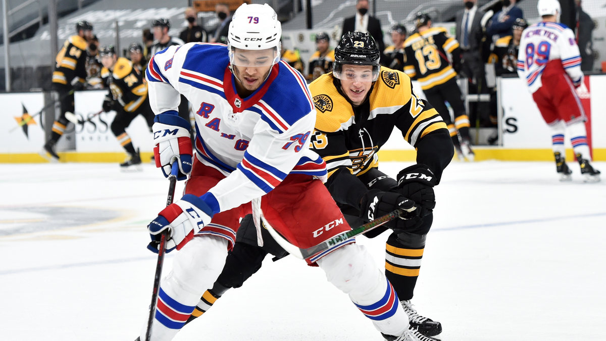 Boston Bruins center Jack Studnicka, New York Rangers defenseman K'Andre Miller