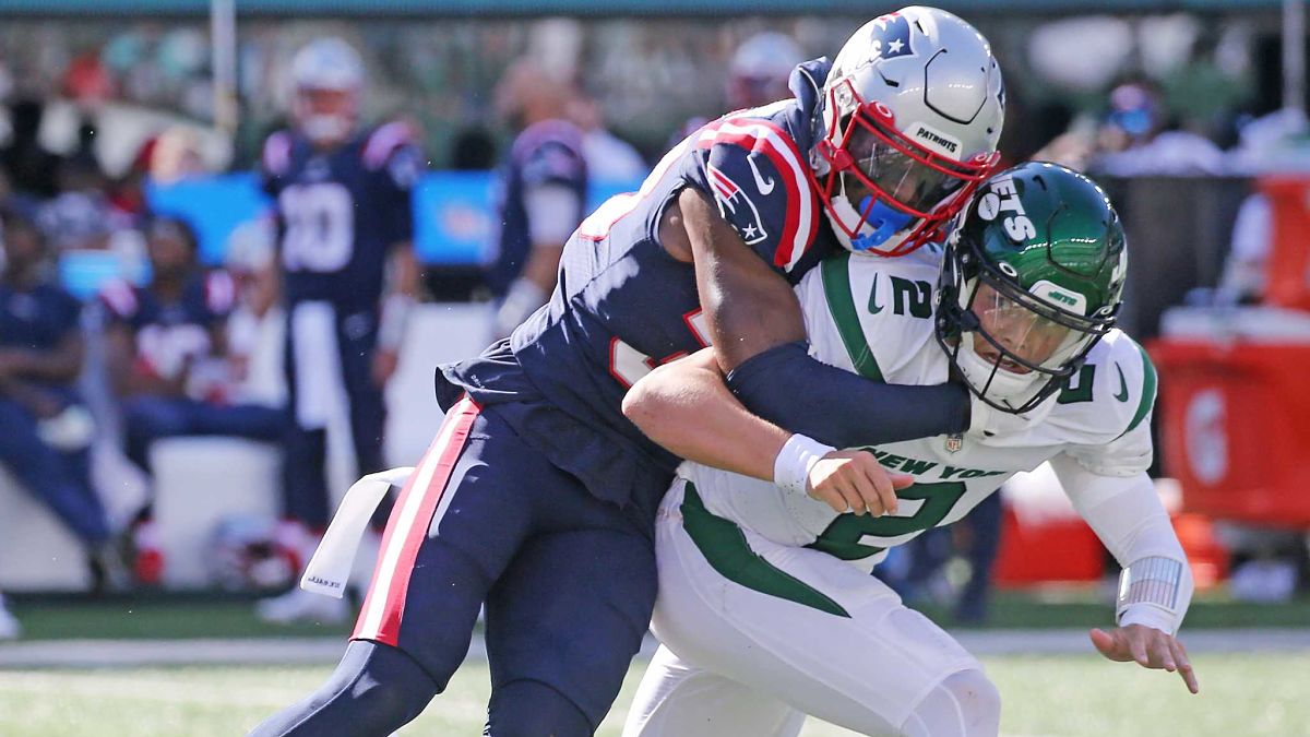 New England Patriots defensive back Joejuan Williams and New York Jets quarterback Zach Wilson