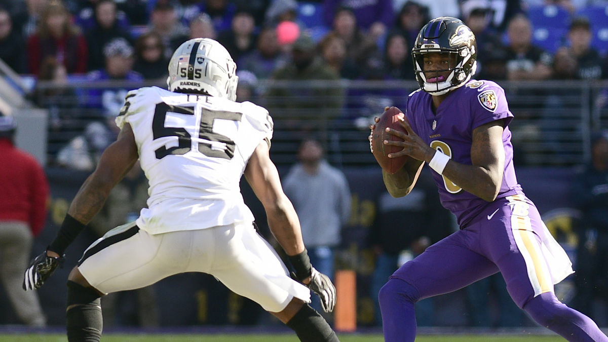Las Vegas Raiders linebacker Marquel Lee and Baltimore Ravens quarterback Lamar Jackson