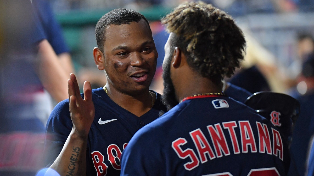 Red Sox third baseman Rafael Devers (left) and outfielder Danny Santana