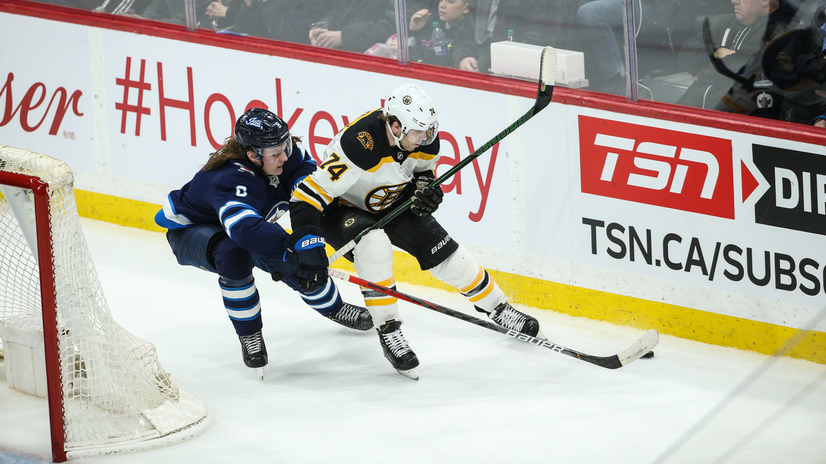 Boston Bruins winger Jake DeBrusk, NHL free agent defenseman Sami Niku