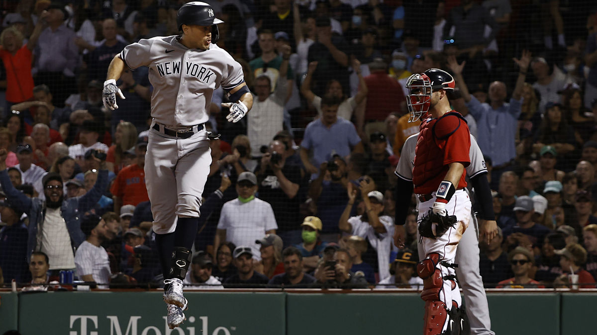 New York Yankees designated hitter Giancarlo Stanton and Boston Red Sox catcher Kevin Plawecki