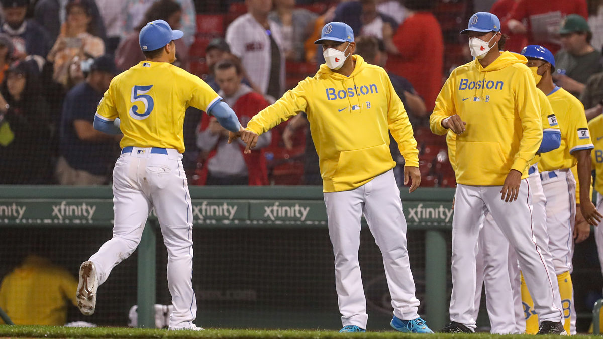 Boston Red Sox manager Alex Cora, center fielder Enrique Hernandez