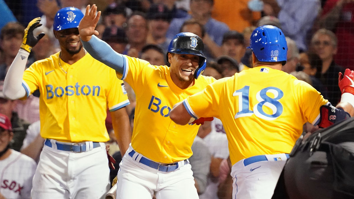 Boston Red Sox left fielder Kyle Schwarber, Kike Hernandez, Xander Bogaerts