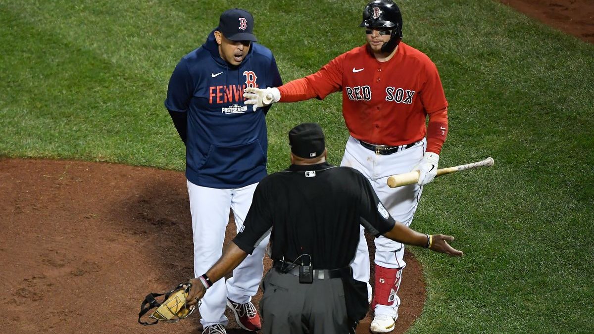 Boston Red Sox manager Alex Cora, designated hitter J.D. Martinez