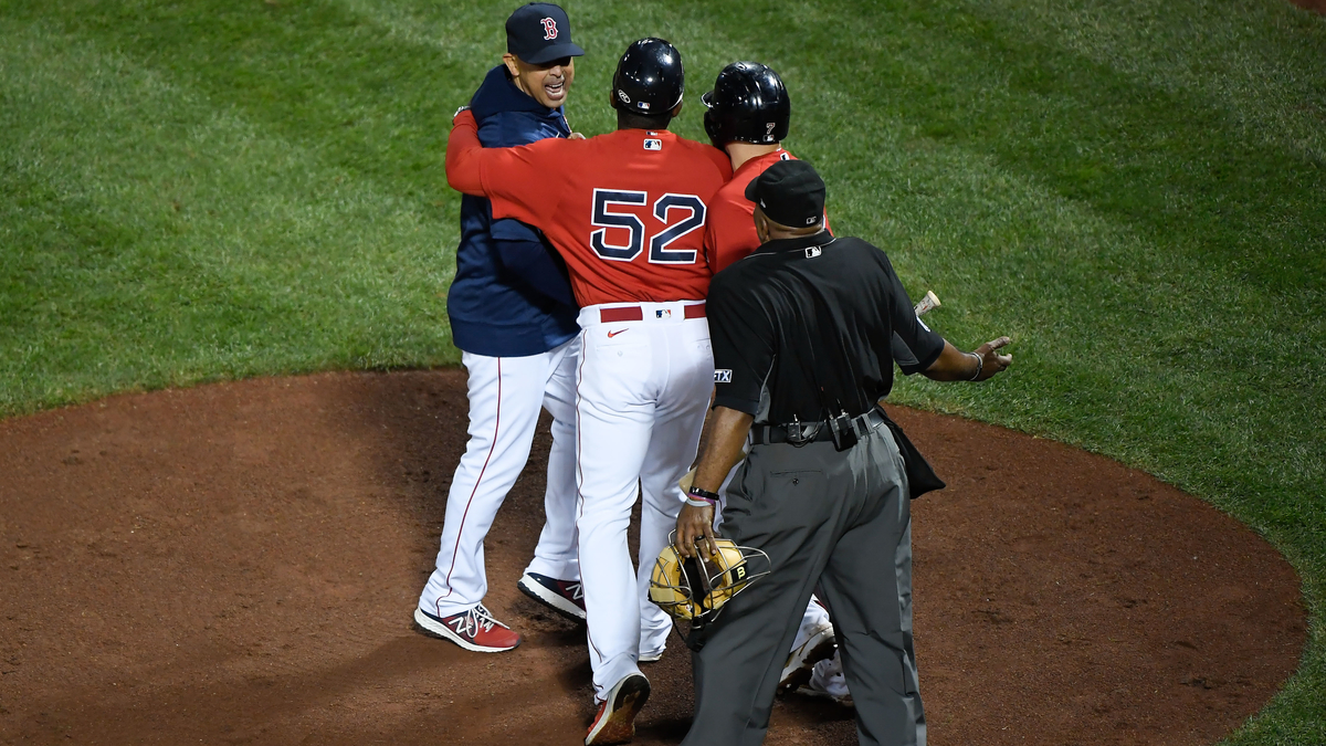 Boston Red Sox manager Alex Cora, umpire Laz Diaz