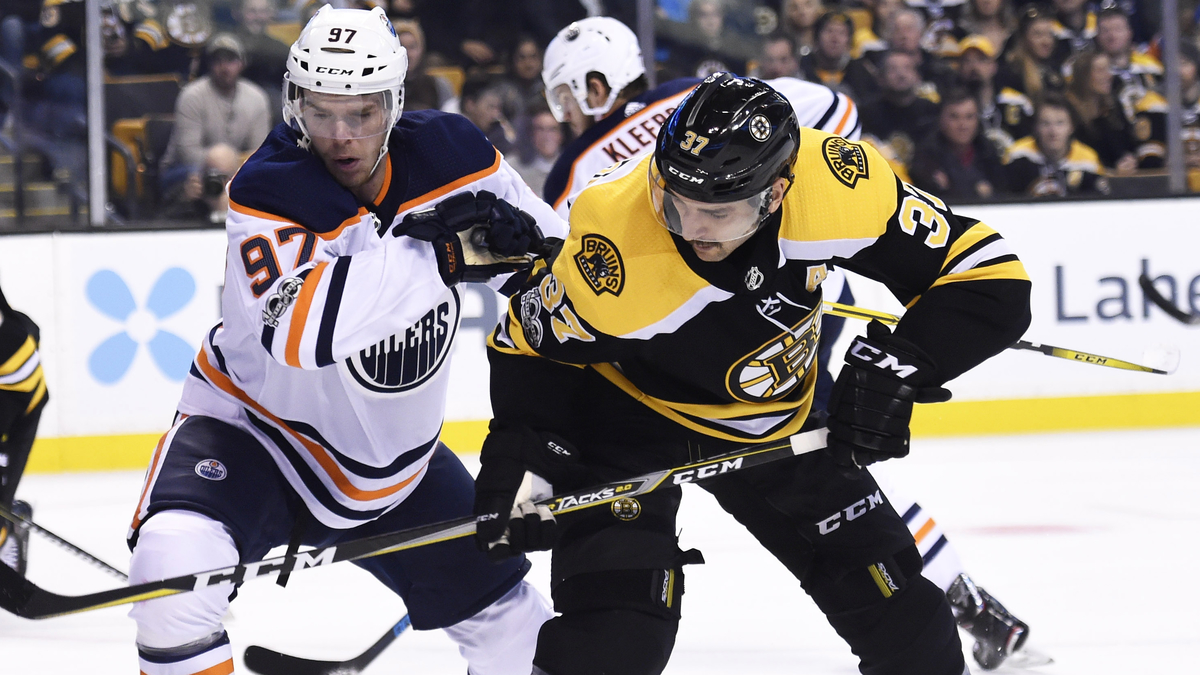 Boston Bruins center Patrice Bergeron, the Edmonton Oilers' Connor McDavid