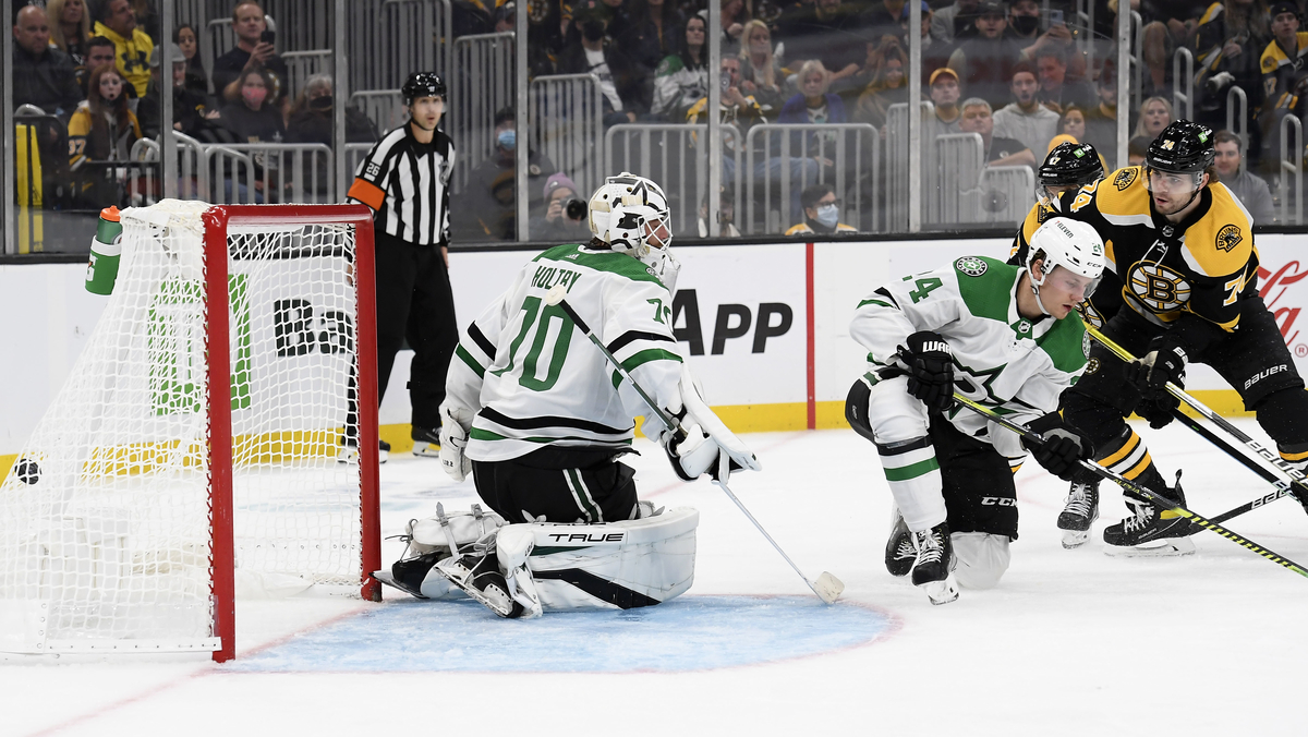 Boston Bruins winger Jake DeBrusk, Dallas Stars goalie Braden Holtby