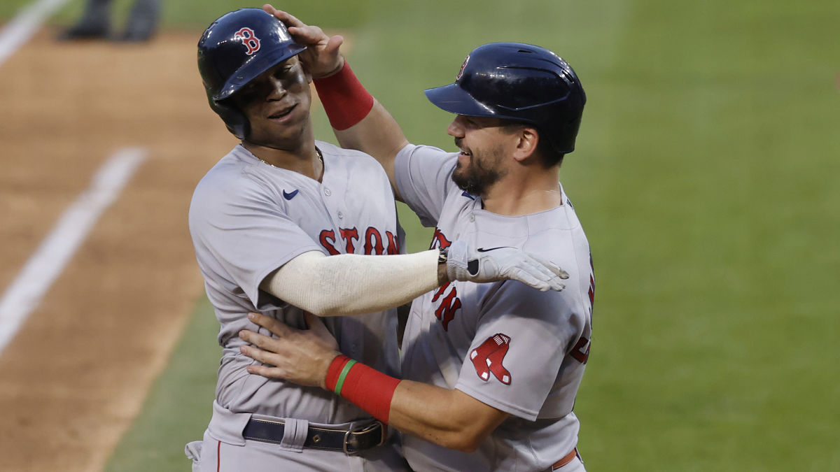 Boston Red Sox third baseman Rafael Devers and designated hitter Kyle Schwarber