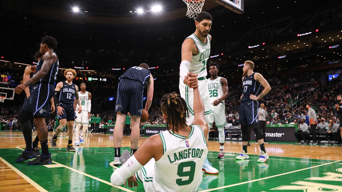 Boston Celtics center Enes Kanter (13) and guard Romeo Langford (9)