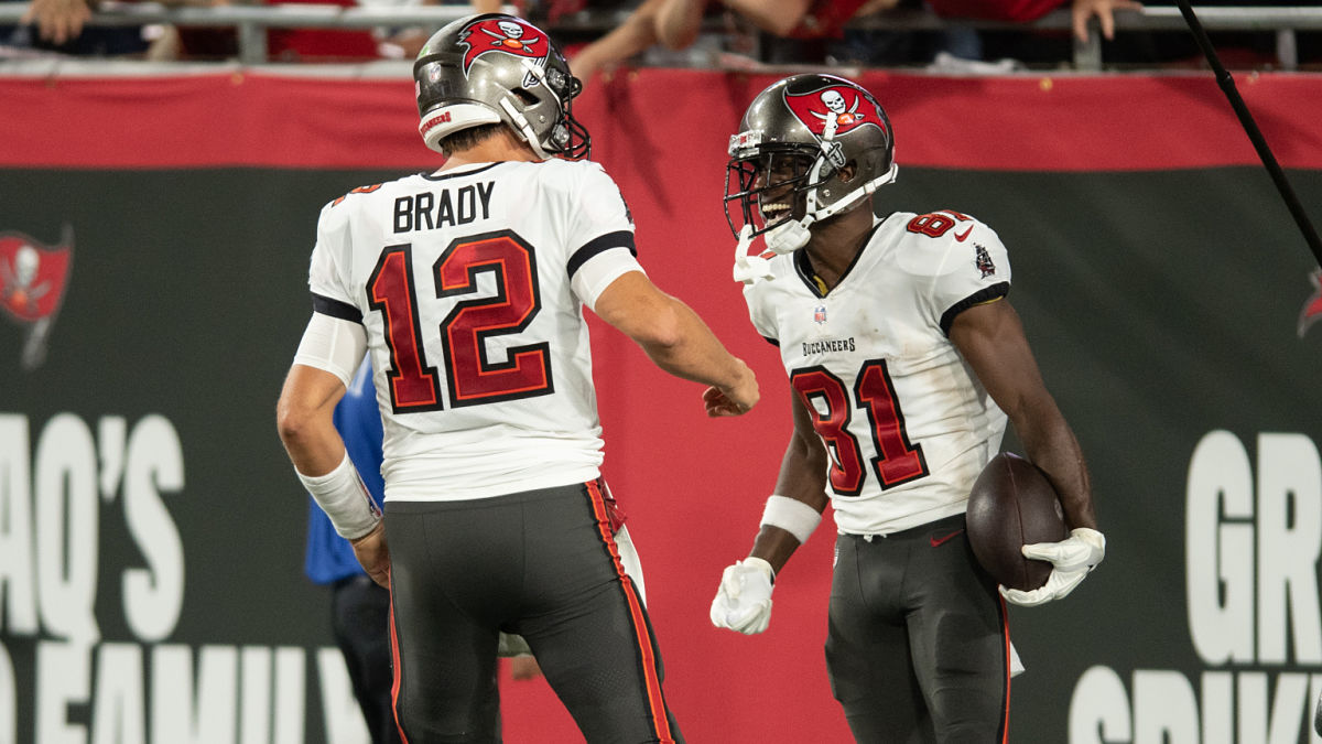 Former New England Patriots players Tom Brady and Antonio Brown