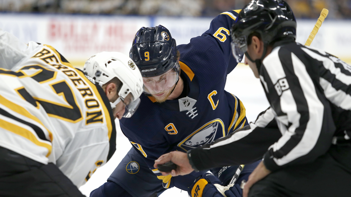 Boston Bruins center Patrice Bergeron, Buffalo Sabres center Jack Eichel