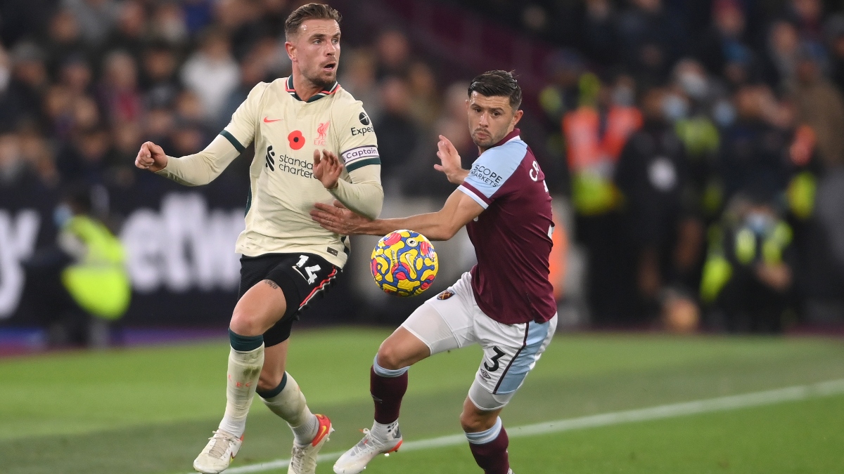 Liverpool midfielder Jordan Henderson (left) and West Ham defender Aaron Cresswell