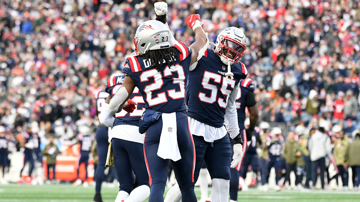 New England Patriots safety Kyle Dugger and linebacker Josh Uche