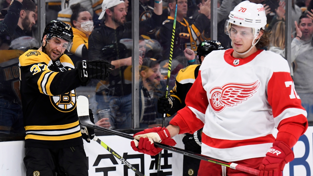 Boston Bruins center Patrice Bergeron (left)