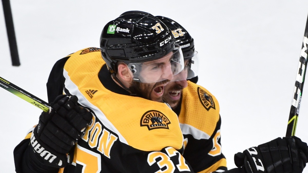 Boston Bruins forwards Patrice Bergeron and Brad Marchand
