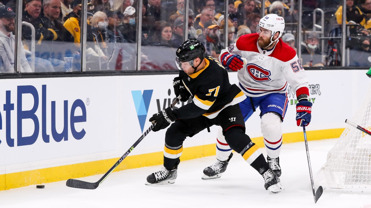 Montreal Canadiens defenseman David Savard (58) and Boston Bruins left wing Taylor Hall (71)