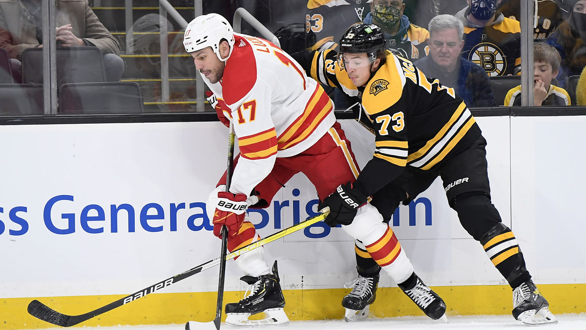 Calgary Flames left winger Milan Lucic, Boston Bruins defenseman Charlie McAvoy