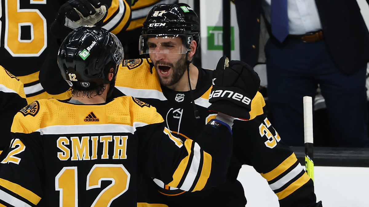 Boston Bruins forward Craig Smith and center Patrice Bergeron