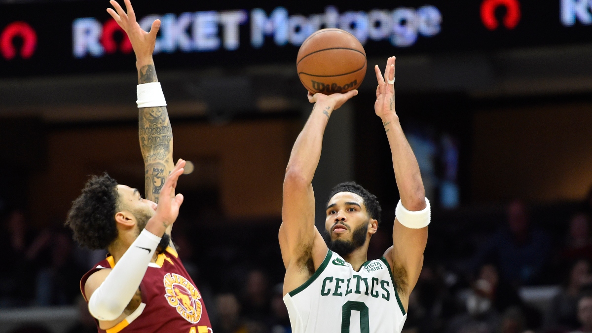 Boston Celtics forward Jayson Tatum (0) and Cleveland Cavaliers guard Denzel Valentine (45)