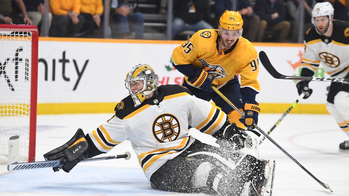 Boston Bruins goaltender Jeremy Swayman (1) and Nashville Predators center Matt Duchene (95)