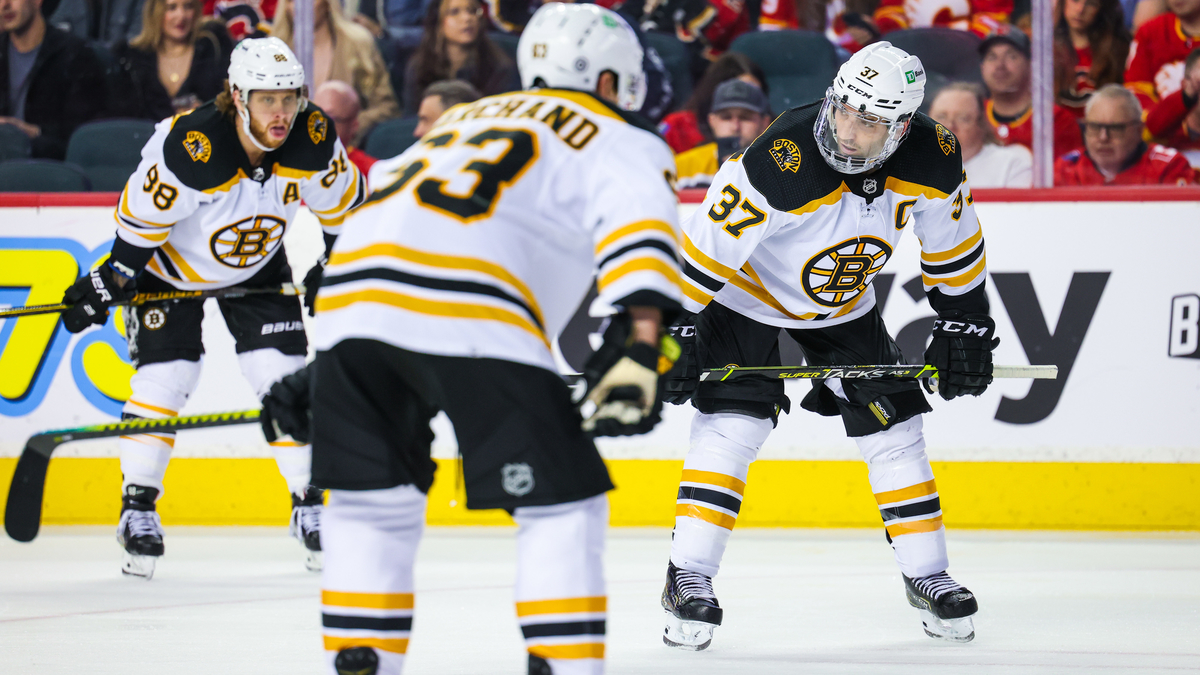 Boston Bruins forwards Patrice Bergeron, Brad Marchand, David Pastrnak